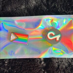 Colorful Pride and Logo Pins